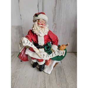 Clothtique possible dreams Santa Claus naughty Nice list wind up music box rooft